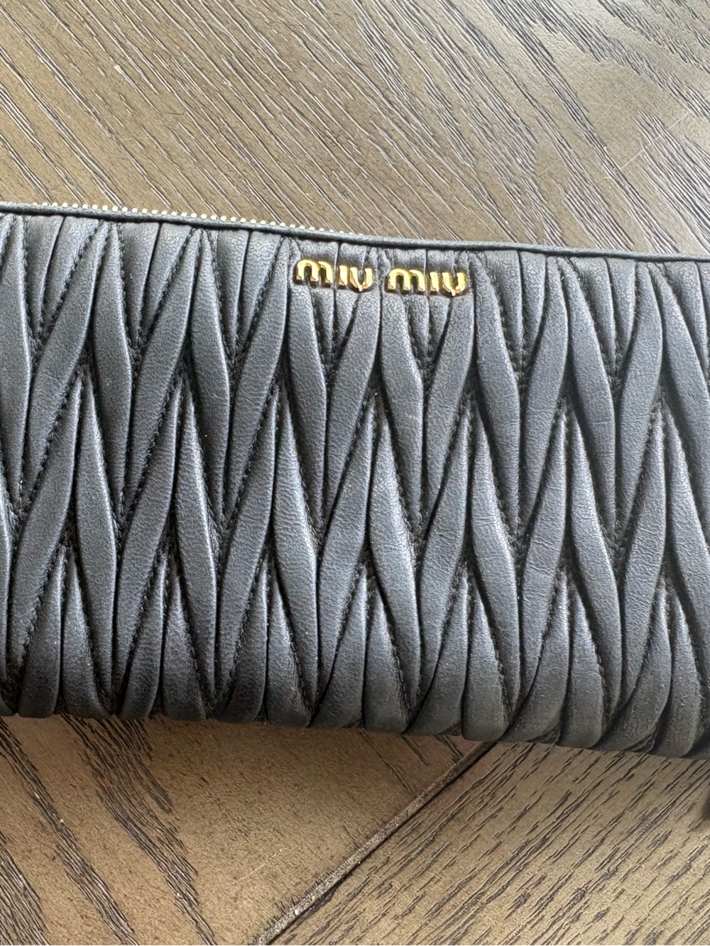 Miu Miu Quilted Zip Wallet in Gray with Gold Logo